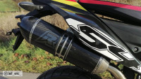 Silenziatore terminale Slip-On Radical Racing interamente in carbonio